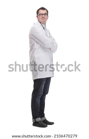 Young doctor man wearing white coat and stethoscope with smile on face