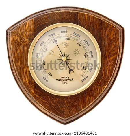 Vintage wooden clock with barometer and Old marine style thermometer on a white background. Wall decor for the interior. Royalty-Free Stock Photo #2106481481