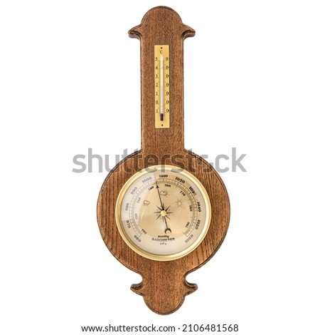 Vintage wooden clock with barometer and Old marine style thermometer on a white background. Wall decor for the interior. Royalty-Free Stock Photo #2106481568