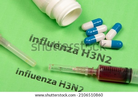 medicines, syringe, in a conceptual situation for the H3N2 flu that spreads across several countries