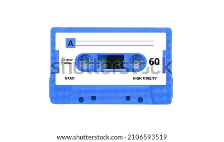 Audio cassette tape blue color with blank label isolated on white background. Retro music and sound, 80s song Royalty-Free Stock Photo #2106593519