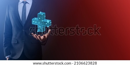 Businessman hand holding 3D plus low polygonal icon.Plus sign virtual means to offer positive thing like benefits, personal development, social network Profit,health insurance, growth concepts