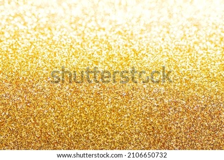 Gold bokeh glitter abstract background.