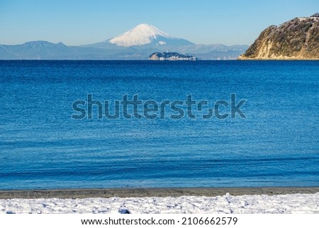 Mt. Fuji and Enoshima from Zushi Beach in Kanagawa Prefecture, Japan Royalty-Free Stock Photo #2106662579