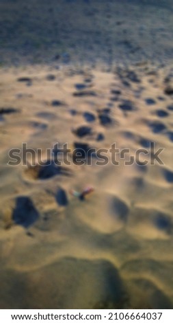 defocused beach sand abstract background