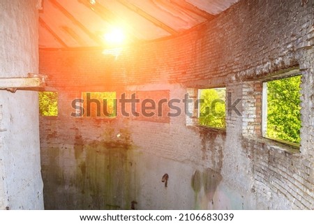 An abandoned pumping station by the river. Background with copy space for text