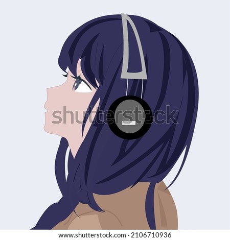 the girl listening music with headphone