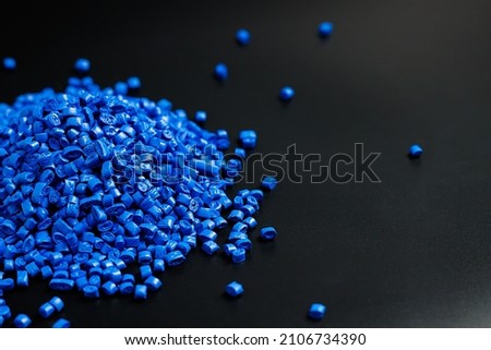 blue granules of polypropylene, polyamide. Background. Plastic and polymer industry. Microplastic products. Royalty-Free Stock Photo #2106734390