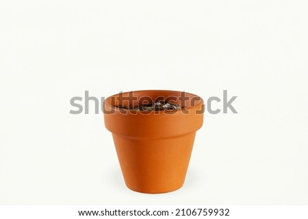empty pot for gardening,nursery,home gardening plant growing with potting soil with copy space in white background