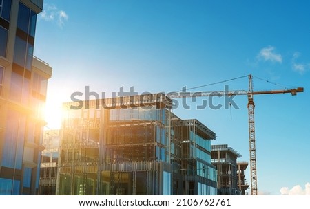 Construction of new luxury modern apartment building. Royalty-Free Stock Photo #2106762761