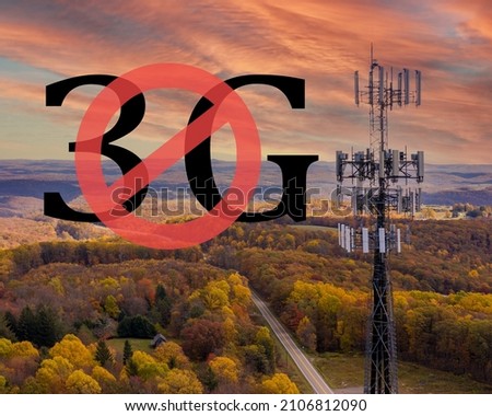End of life for 3rd generation or 3G cell mobile networks illustrated with sign superimposed on rural cellphone tower Royalty-Free Stock Photo #2106812090