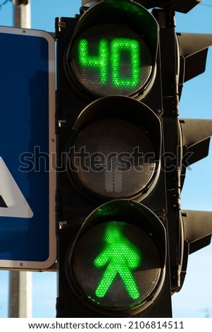 traffic light for pedestrians, shining green