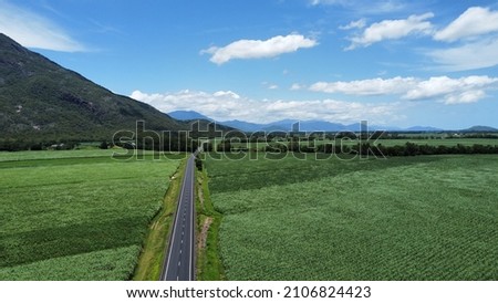 Landscape Photo Of Farming Fields, Roads and Mountain