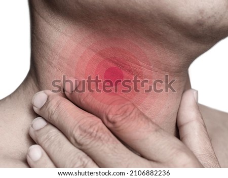 Redness at neck of Asian, Myanmar man. Concept of sore throat, pharyngitis, laryngitis or dysphagia. Royalty-Free Stock Photo #2106882236