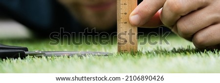 Perfectionist Measure Perfect Grass. Obsessed Meticulous And Compulsive Royalty-Free Stock Photo #2106890426