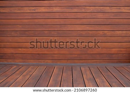 Hardwood cumaru deck oiled texture- wood decking surface sanded and freshly oil refinished after restoration Royalty-Free Stock Photo #2106897260