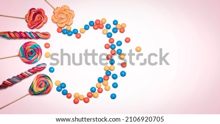 The heart image created with colorful candies and bonbons is suitable for use as Valentine's Day and greeting cards.