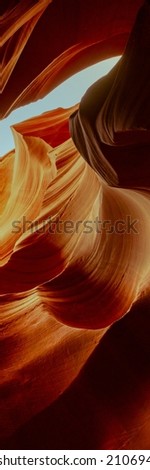 Antelope Canyon in the Navajo Reservation near Page, Arizona USA. Vertical abstract background