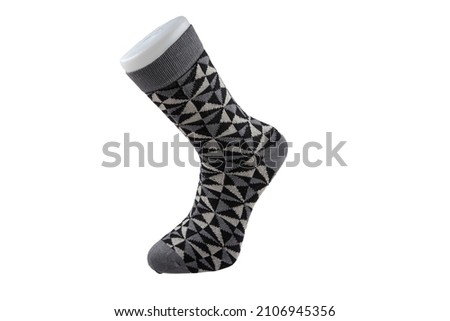  colorful socks isolated on white background. Different colors of socks are red, green, yellow, blue, etc. winter accessories. volumetric sock.

