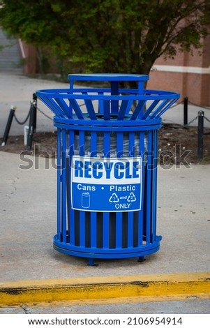 Blue recycle bin to collect cans and plastic ony 1 and 2