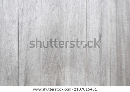 Close up aged gray wooden fence texture for background.