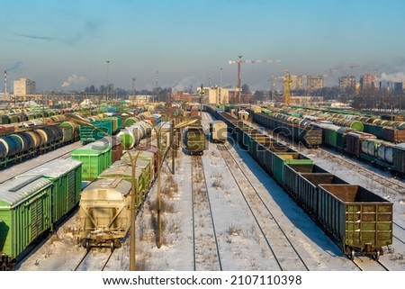 parking of freight cars. railway depot in winter on a sunny day. background picture.