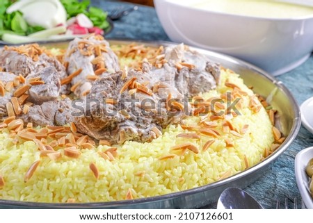 Jordanian meal, Mansaf with almond  Royalty-Free Stock Photo #2107126601