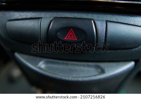 the emergency alarm button on the car.