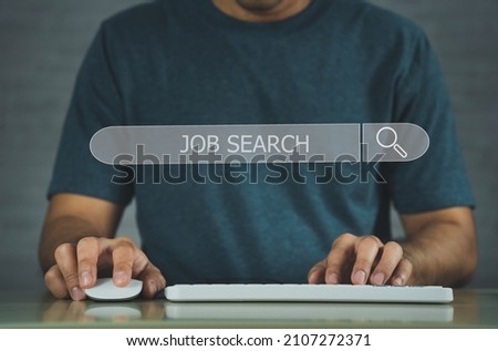 Businessman searching browsing internet jobs with blank search bar. Search engine optimization SEO networking concept. businessman working with computer laptop on desk in office.