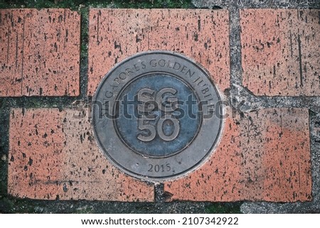 SG50 Commemorative plaque on the pavements of Singapore to celebrate 50 years of independence