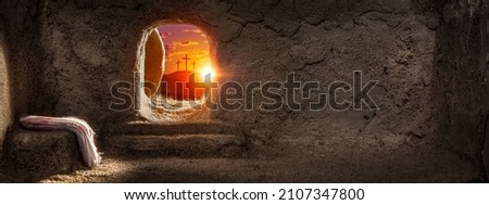 View From Inside Tomb At Sunrise With Grave Clothes And Three Crosses - Resurrection Of Jesus Christ Royalty-Free Stock Photo #2107347800