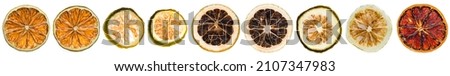dried citrus slices orange lemon and lime. Slices of dried lemon for decoration. lime laid out on a white background Royalty-Free Stock Photo #2107347983
