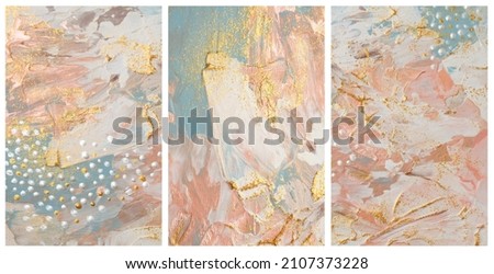 Art acrylic and watercolor smear blot painting. Interior abstract triptych wall. Beige, brown and gold color canvas texture horizontal background. Royalty-Free Stock Photo #2107373228