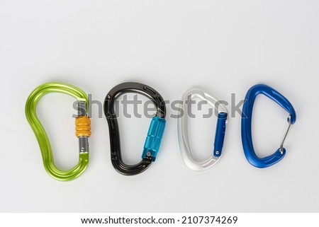 Carabiners with  screw lock, with automatic twist lock, with straight gate and wire gate. Royalty-Free Stock Photo #2107374269