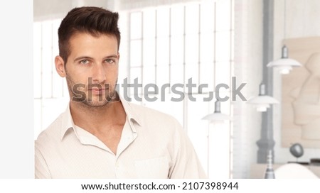 Portrait of young white man at home in 30s. Copy Space. Royalty-Free Stock Photo #2107398944