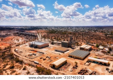 Open pit minerals and metal ore Junction Mine in Broken hill silver city - elevater aerial cityscape. Royalty-Free Stock Photo #2107401053