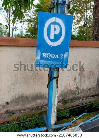 two-wheeled vehicle (motorcycle) parking sign board
