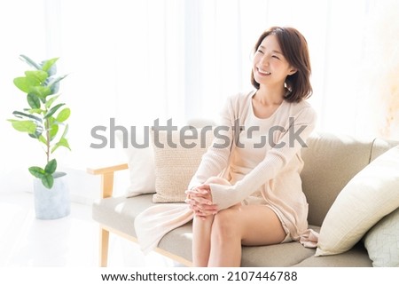 young attractive asian woman relaxing