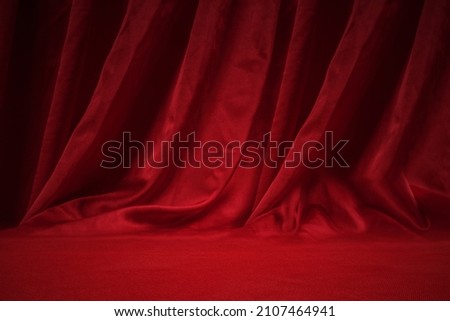 Closeup view of the red curtain for background Royalty-Free Stock Photo #2107464941