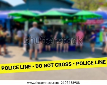 Police Line Do Not Cross concept photo, background blurred.