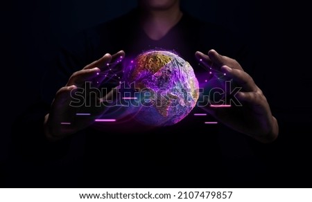 World Technology Concepts. Global Network and Data Exchange. Worldwide Business. Telecommunication, Finance and Internet of Things. Gesture Hand Levitating Globe Royalty-Free Stock Photo #2107479857