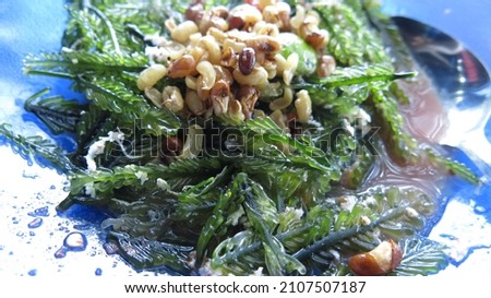 Rujak Bulung Boni is a traditional Balinese salad made of fresh seagrapes seaweed in hot boiled fish sauce or kuah pindang
