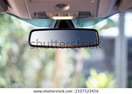 Car rear view mirror inside the car with  clipping path. Royalty-Free Stock Photo #2107523456