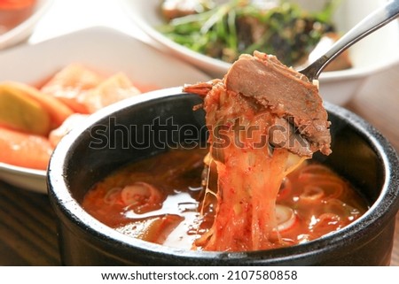 Beef soup is one of the favorite dish of Korean. It is a red soup made with beef and a few vegetables, cooked in a slightly spicy sauce. This dish is served with rice and several side dishes(Banchan). Royalty-Free Stock Photo #2107580858