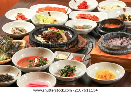 Seokgalbi is a Korean food that you cook galbi and put it on a warm stone plate. Royalty-Free Stock Photo #2107611134