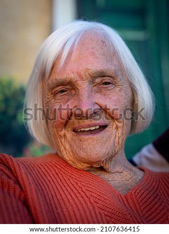Aged candid woman close up portrait , high photo 