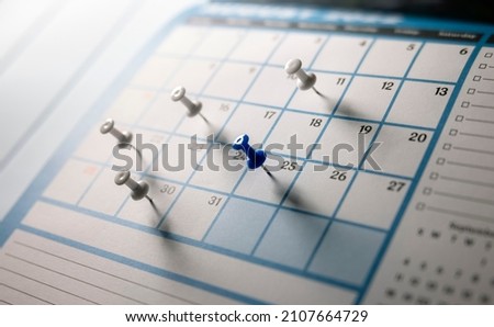 Thumbtack in calendar concept for busy, appointment and meeting reminder Royalty-Free Stock Photo #2107664729