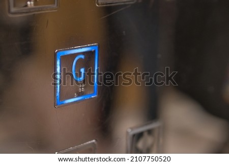 Ground floor button for elevator