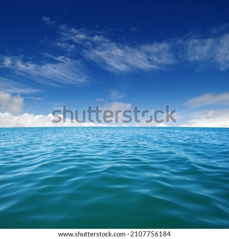 Blue sea water surface on sky