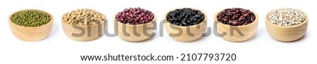 Collection of mix bean (red kidney, green mung, black bean, soy beans, adzuki and millet ) in wooden bowl isolated on white background. Royalty-Free Stock Photo #2107793720